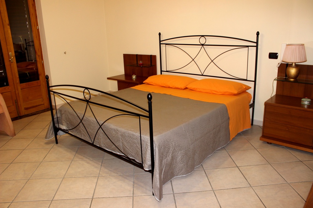 Camera da letto matrimoniale - Casa Vacanza RC55 a Rocca di Capri Leone